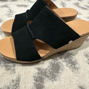 UGG Black and Tan Sandals with Crisscross Straps